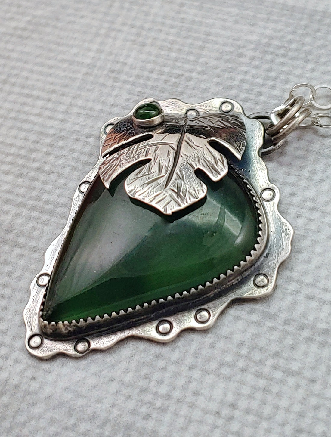 Green serpentine monstera leaf necklace