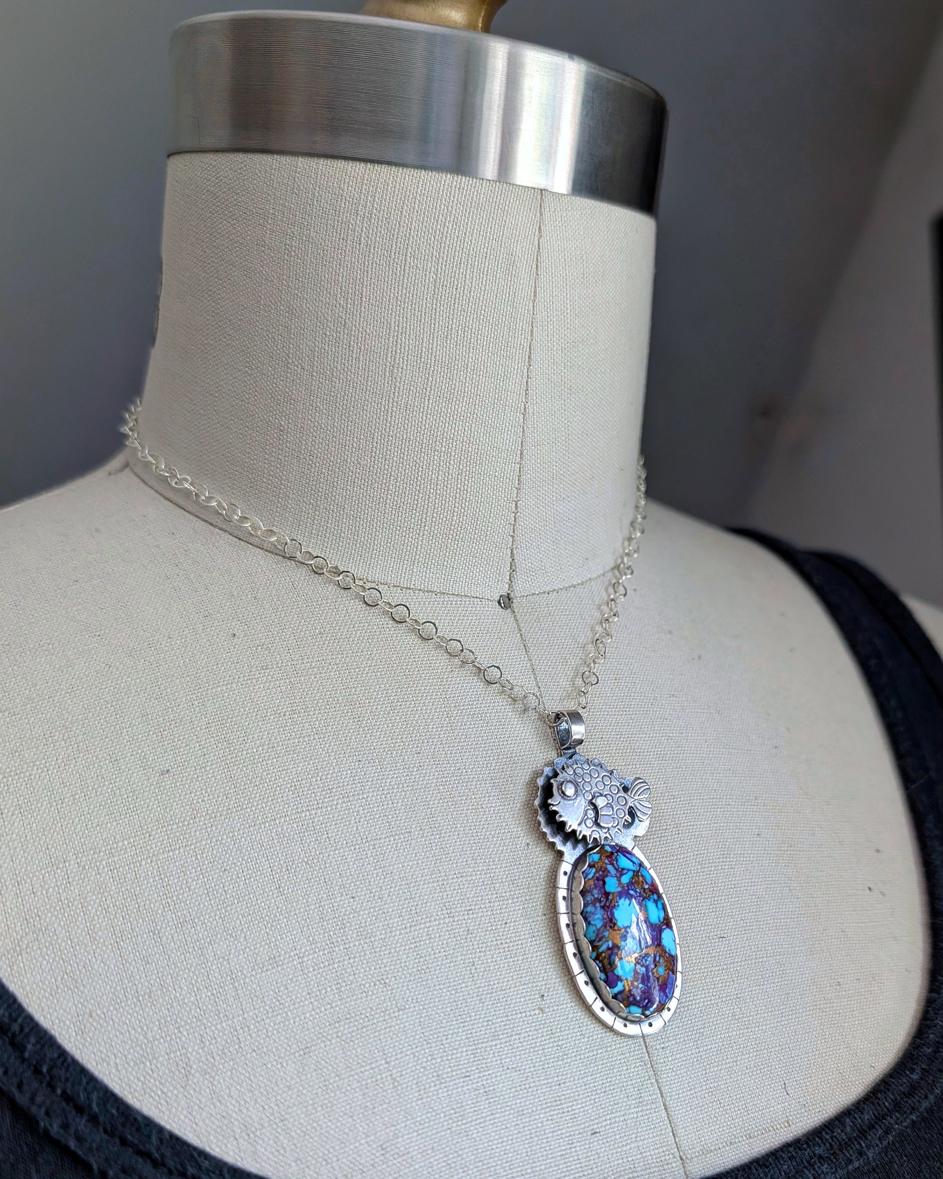 Necklace on dress form