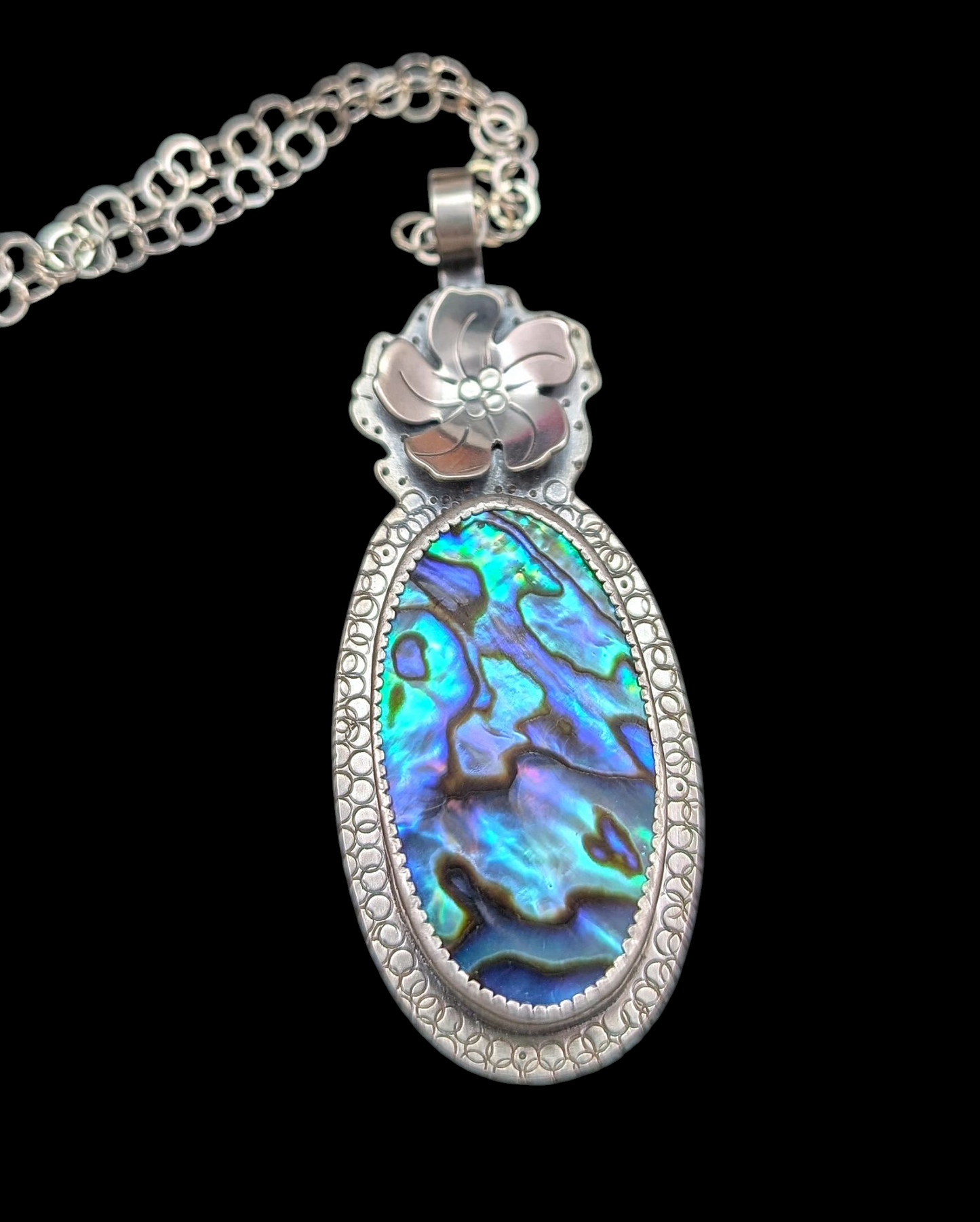 Abalone necklace in sterling silver on black background
