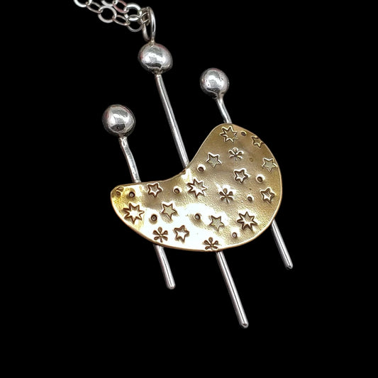 Modernist kidney shaped design in brass and sterling silver necklace