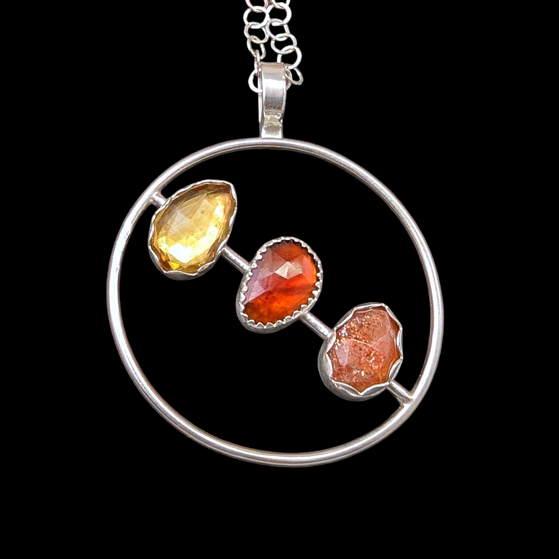 Mid century modern inspired rosecut citrine, garnet, sunstone on a sterling silver necklace