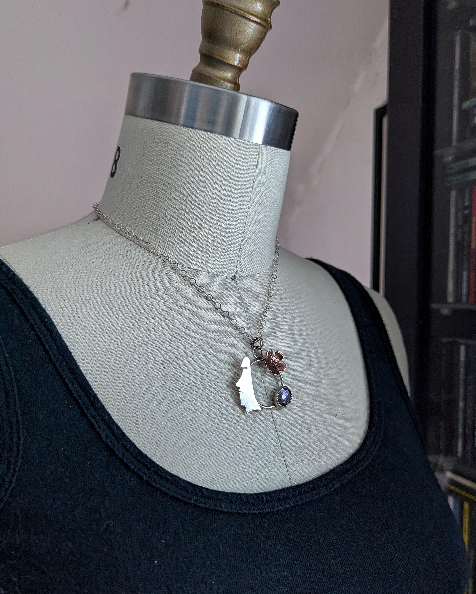 Easter Island Moai statue sterling silver and copper necklace with ametrine shown on a dress form