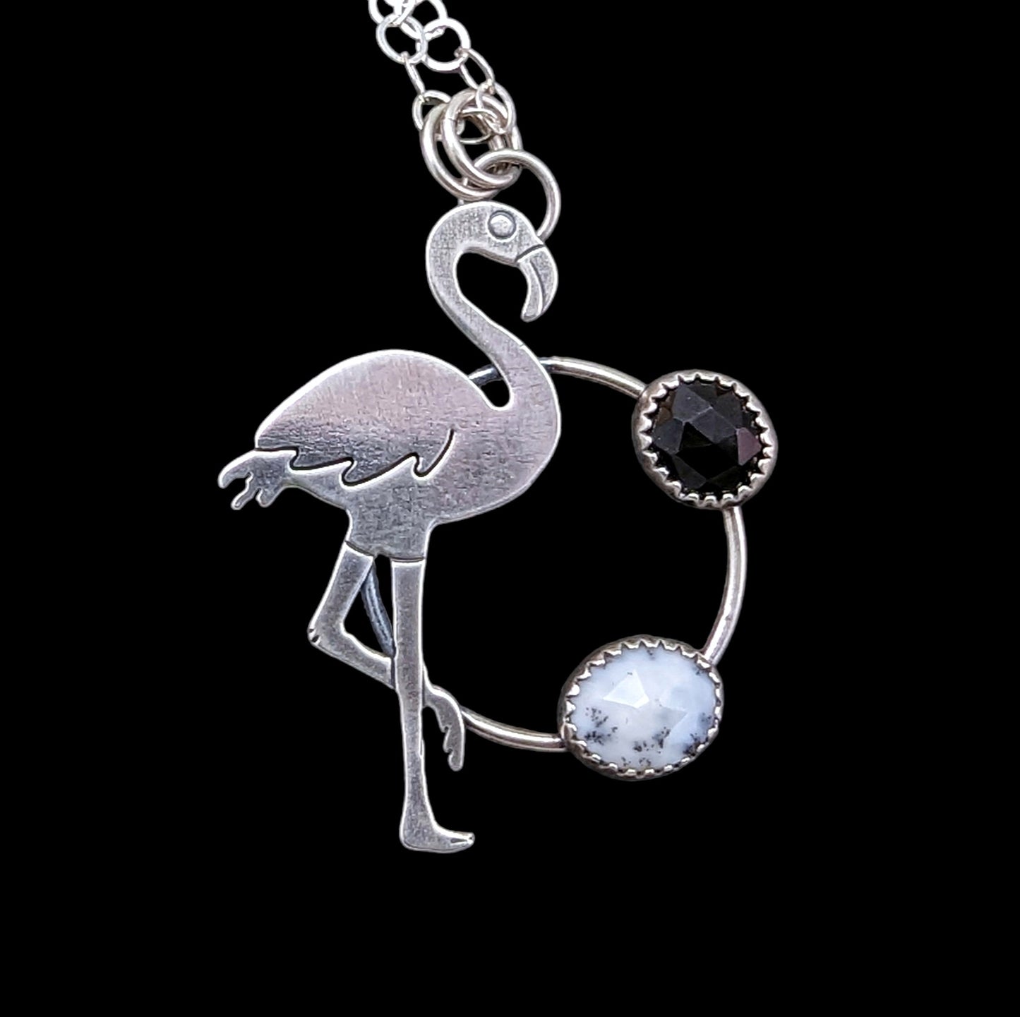 Flamingo necklace with black and white stones