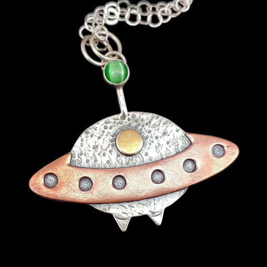 Sterling silver, copper and brass spaceship with cats eye stone necklace.