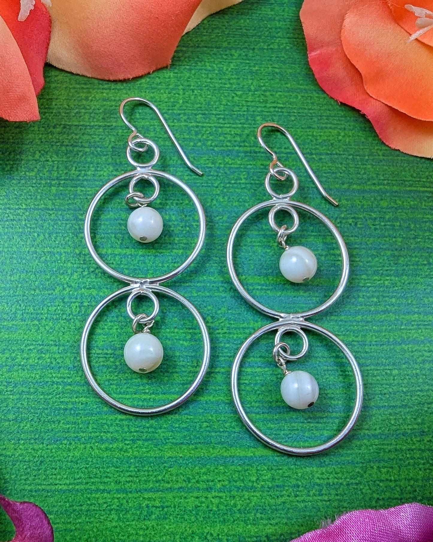 Sterling silver double circle earrings with mother of pearl beads