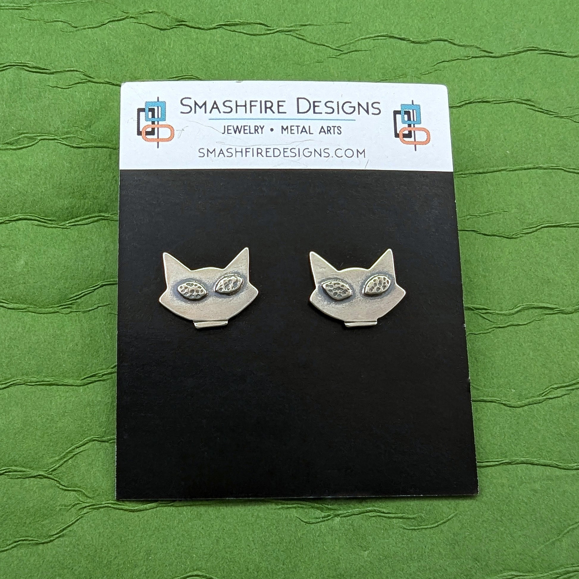Sterling silver cat head stud earrings