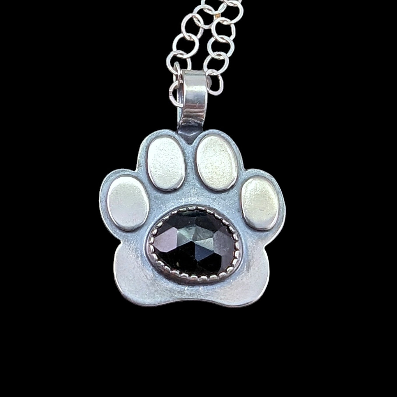 Sterling silver paw necklace with rosecut onyx