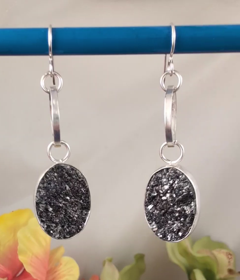 Video of sterling silver dangled earrings featuring sparkly black druzy