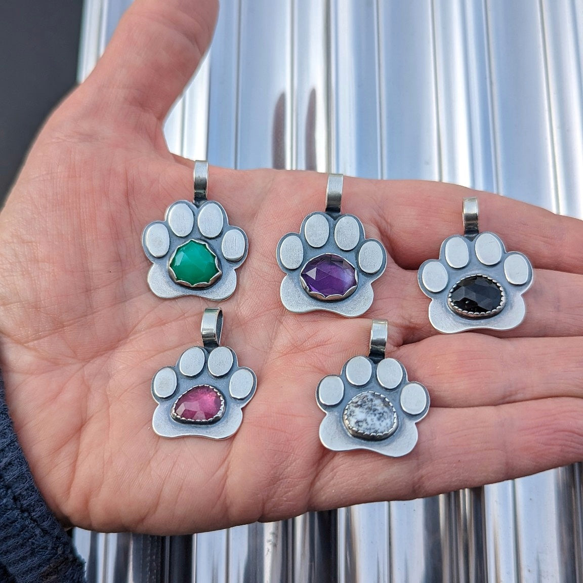 Sterling silver paw necklaces with various gemstones