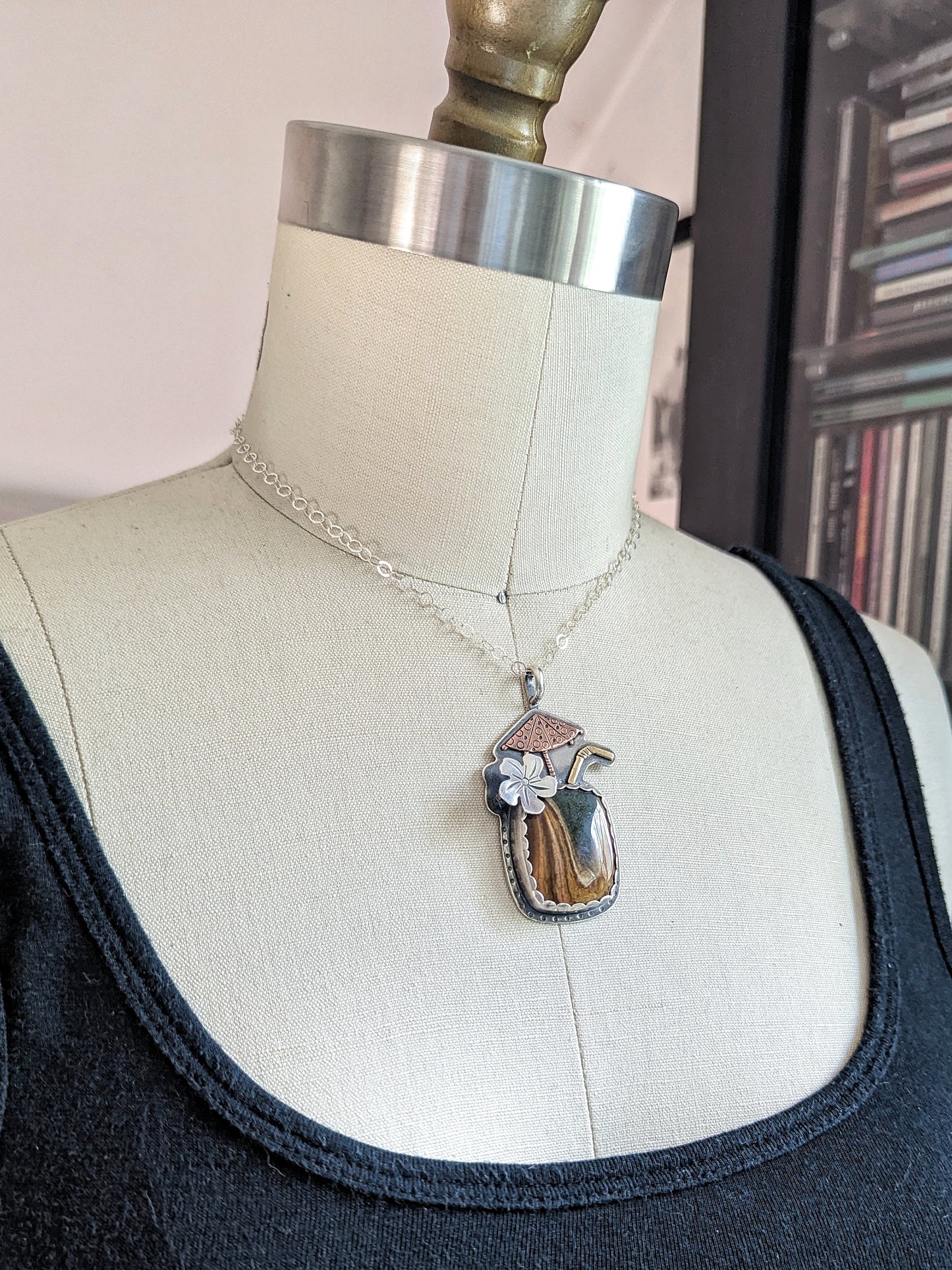 Tiki drink necklace on a dress form