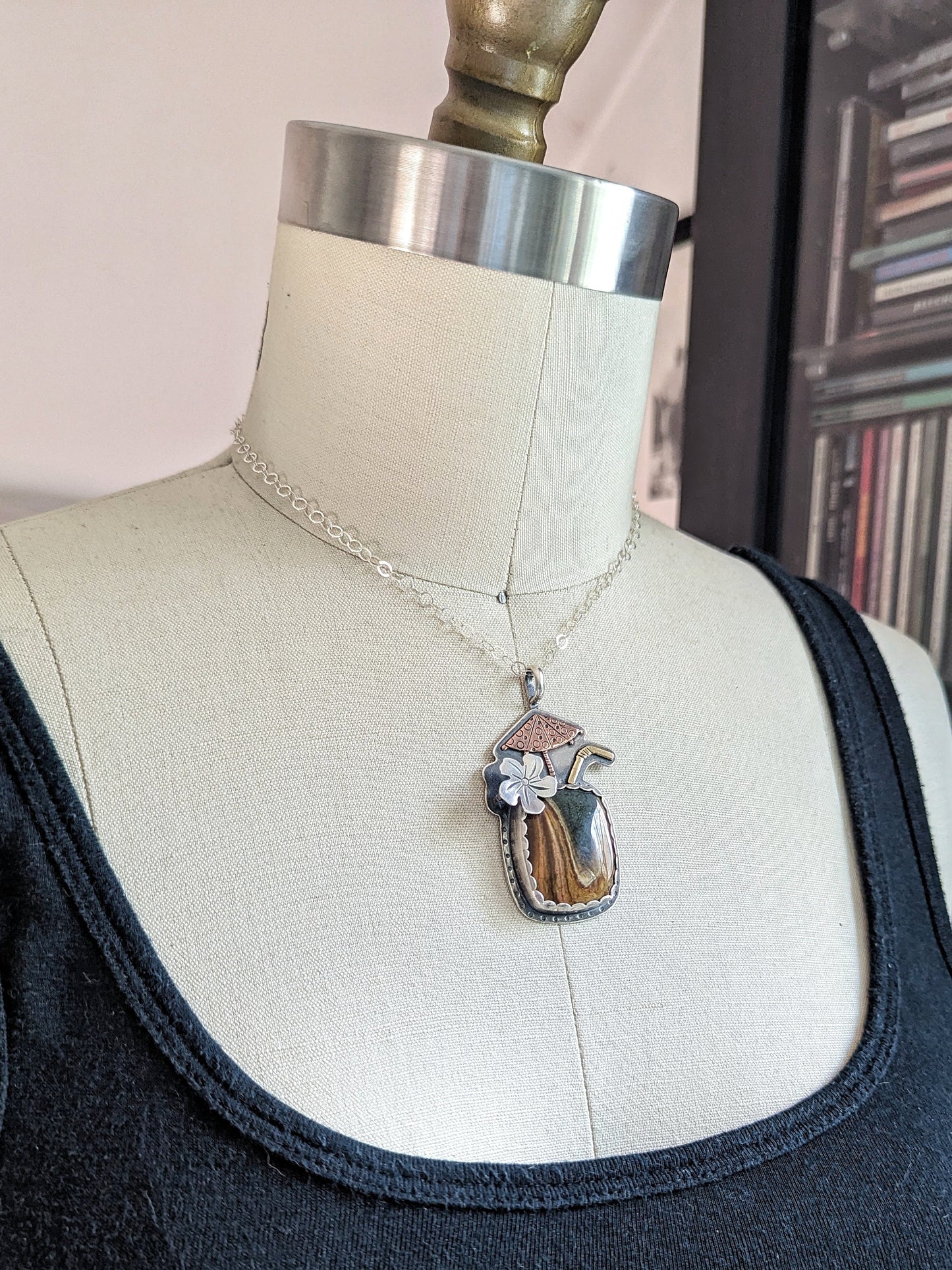 Tiki drink necklace on a dress form