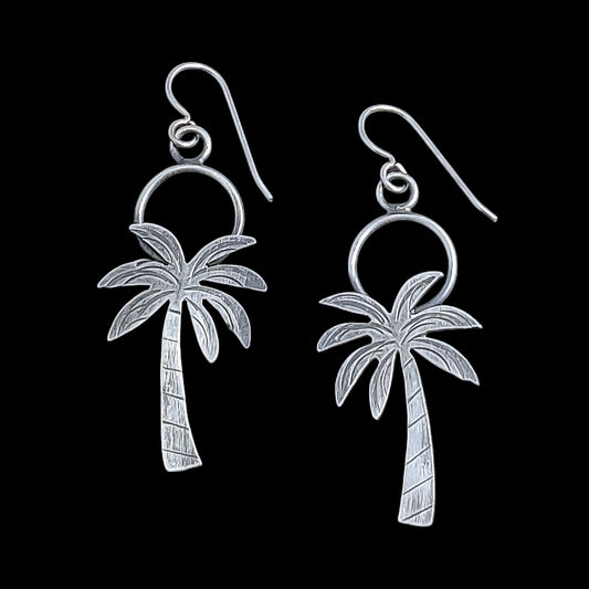 Handmade sterling silver dangly palm tree earrings.