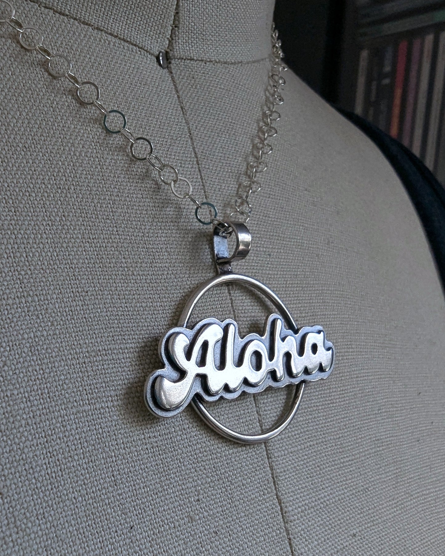 Side view on a bust of Aloha necklace