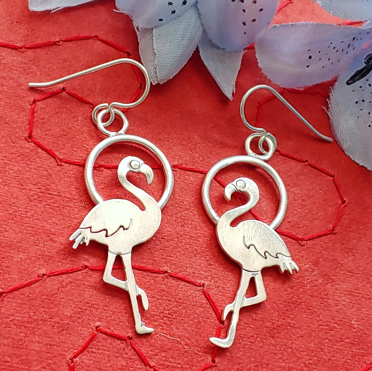 Sterling silver flamingo earrings that are very lightweight and perfect accessories for your Tiki outfits