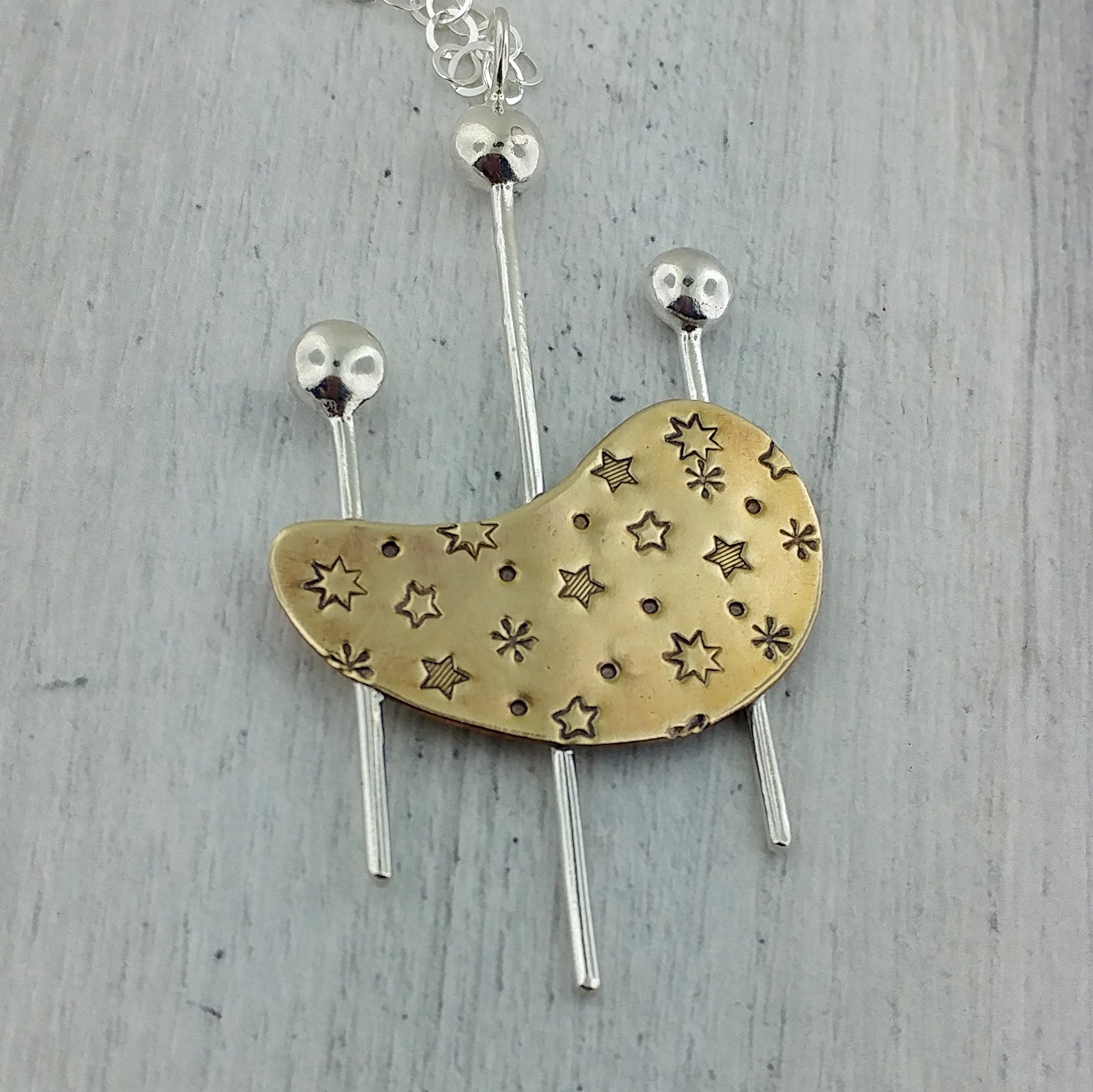 Mid mod brass kidney shaped necklace with sterling silver rods