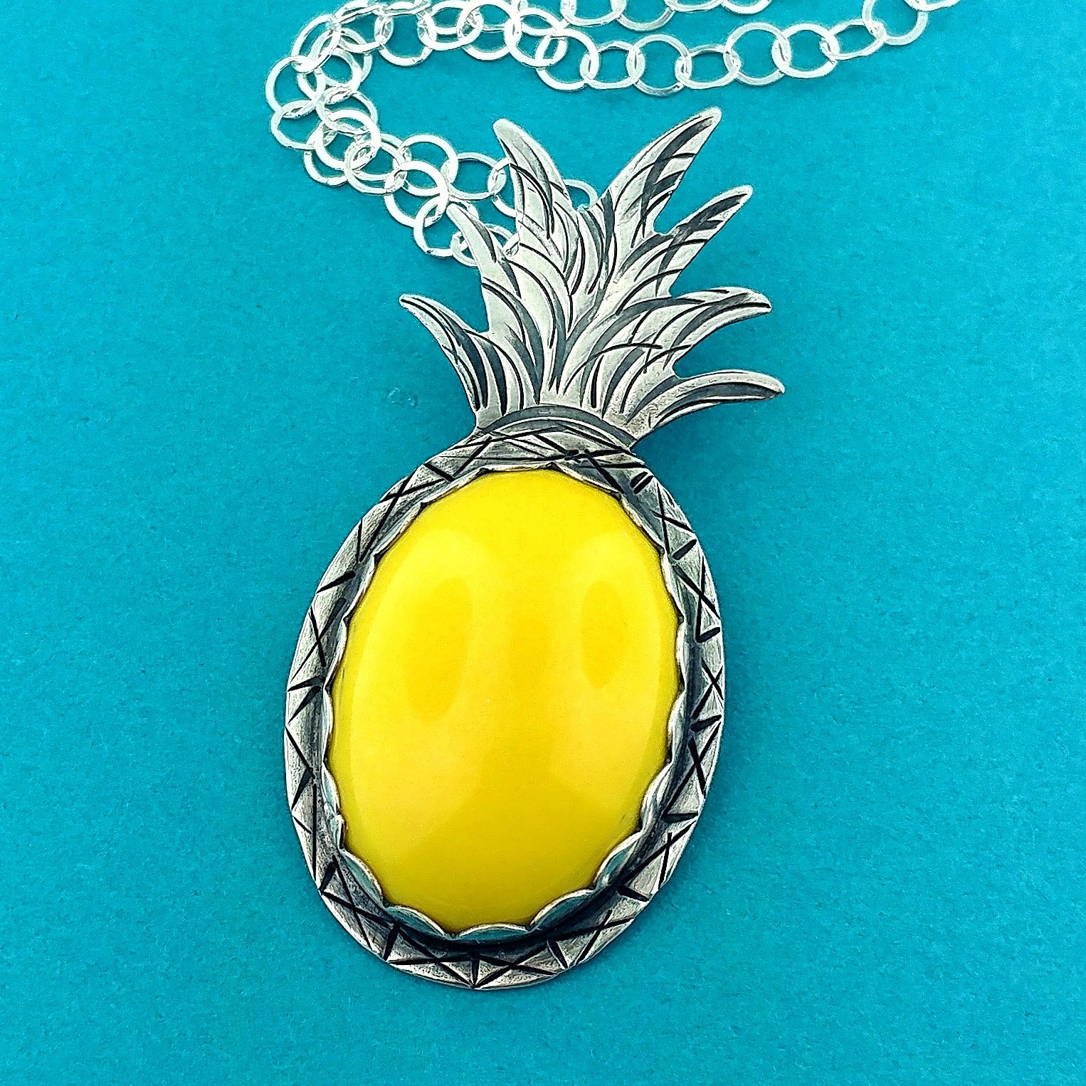 Beautiful yellow vintage lucite oval stone set in a handmade sterling silver pineapple