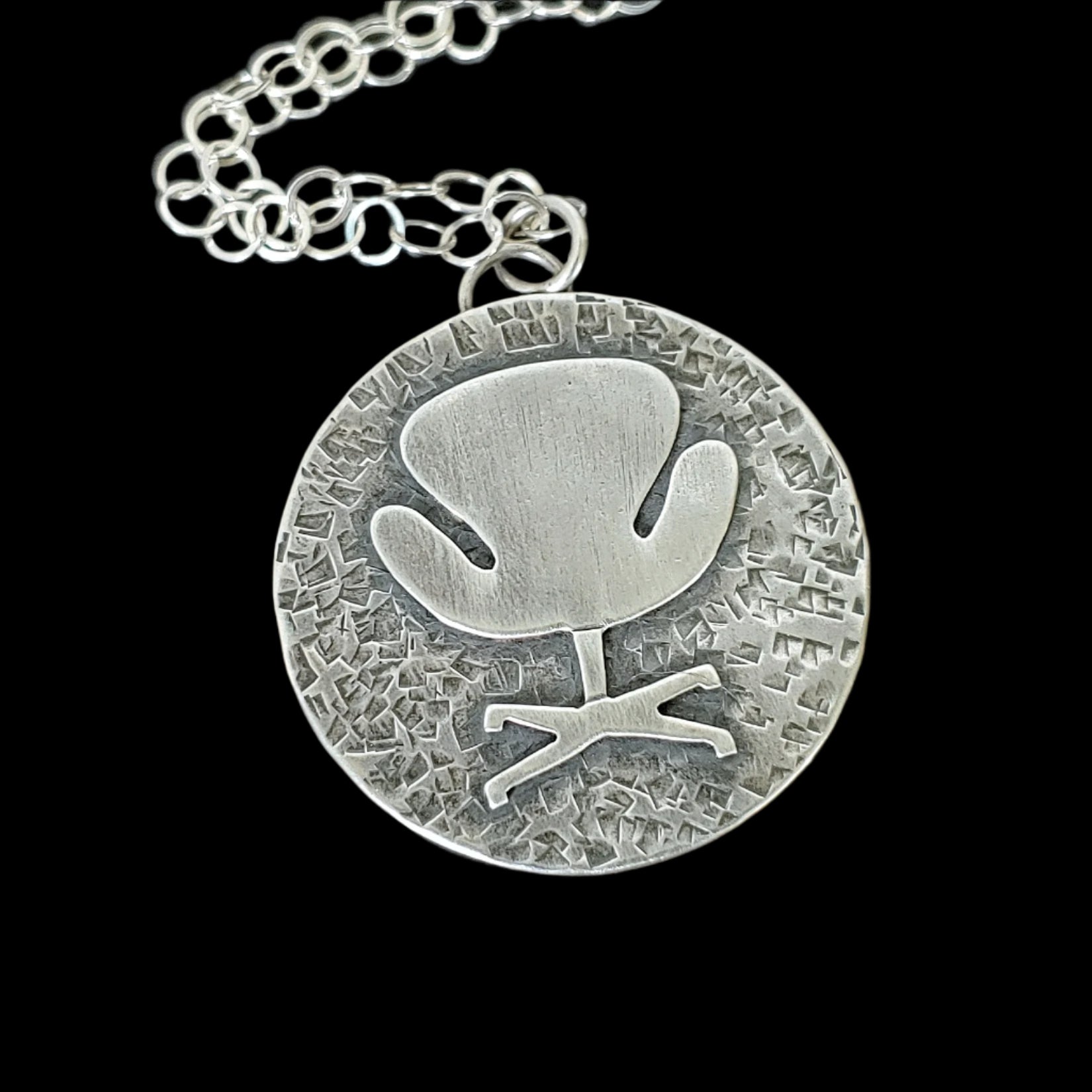 Mid century modern swan chair necklace handmade in sterling silver which is perfect for the 17th wedding anniversary gift of furniture