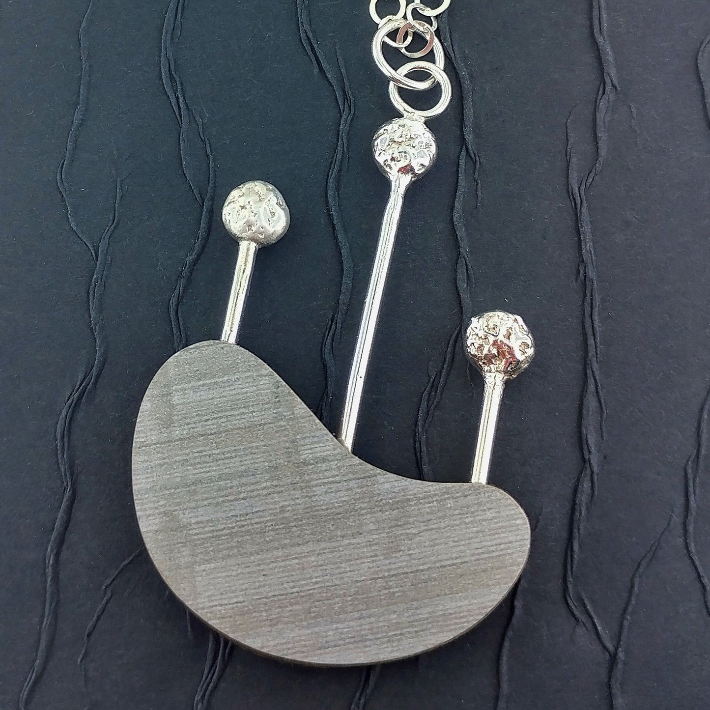 Boomerang laminate on wood necklace