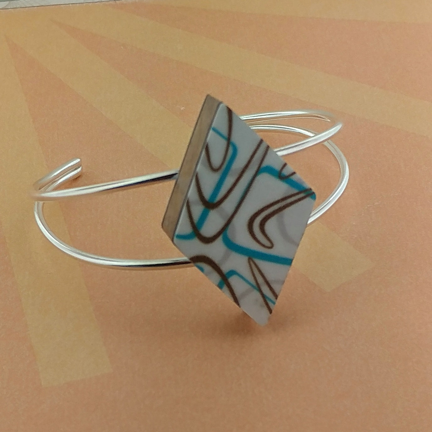 Diamond Shaped Boomerang Laminate Bracelet