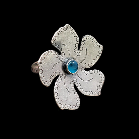 Sterling silver plumeria Tiki ring with light blue stone with fine detailing