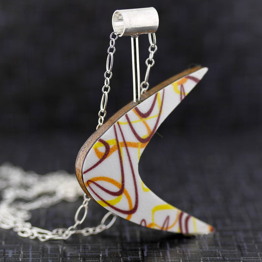 Boomerang Shaped Reversible Laminate Necklace - Orange/Yellow/Brown
