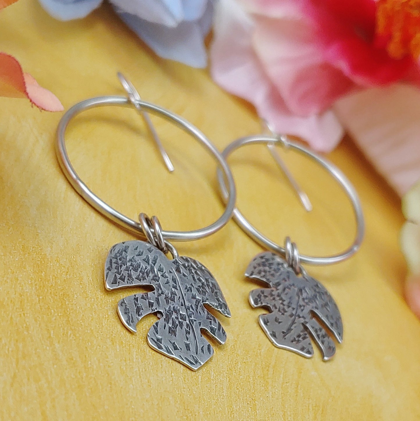 Light monstera Tiki leaf earrings in sterling silver