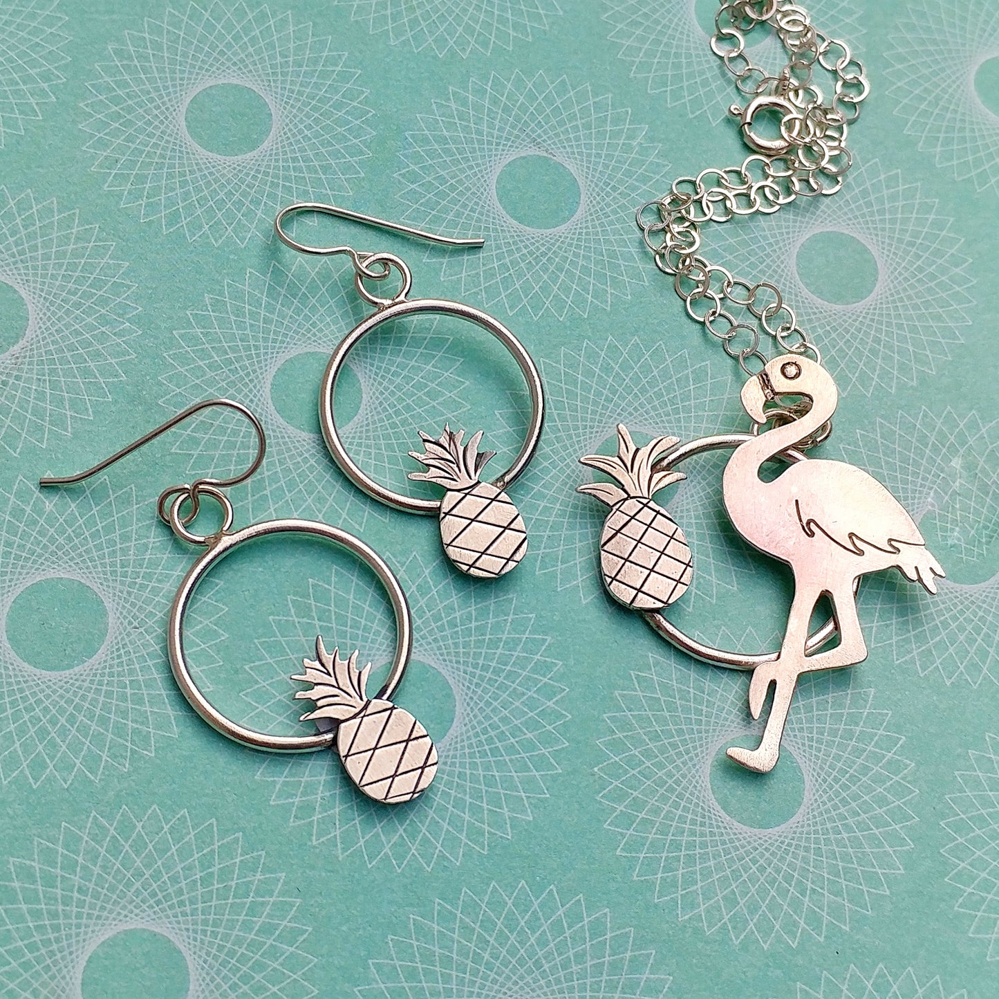 Sterling silver pineapple and flamingo necklace and earrings