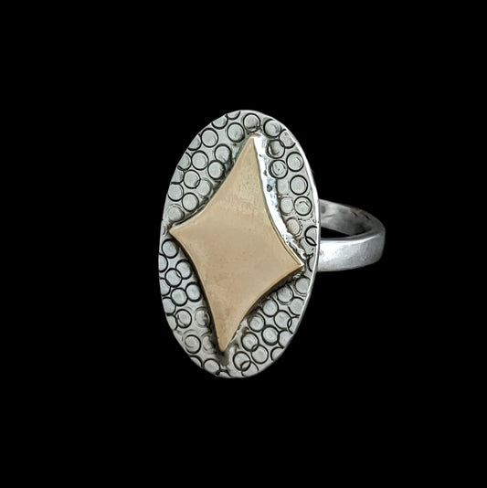 Retro diamond mid century modern inspired ring made in sterling silver with a brass starburst