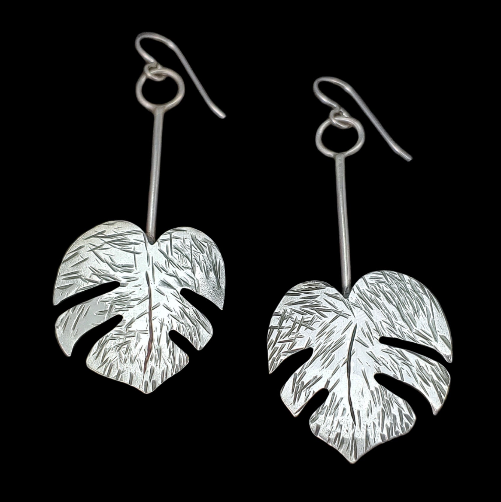 handmade sterling silver monstera leaf  lightweight Tiki earrings