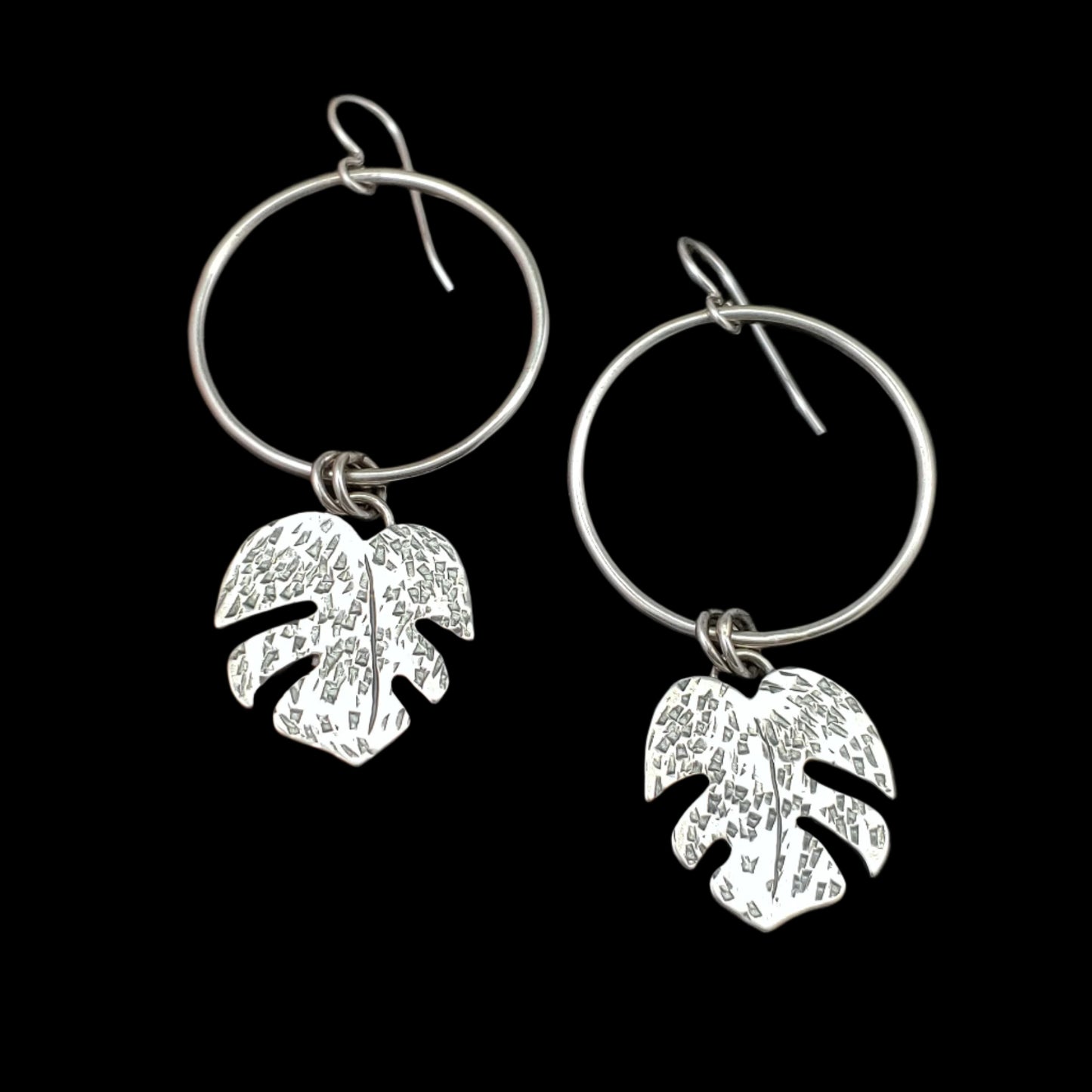 sterling silver monstera leaves dangling from circle hoops