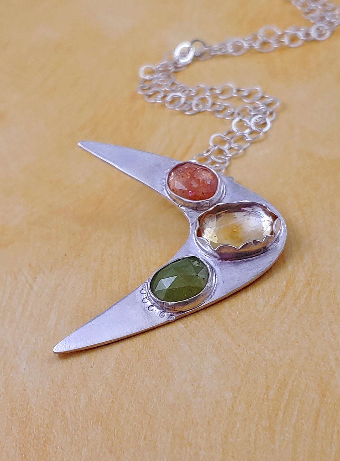 Orange yellow and green gemstone sterling silver boomerang necklace
