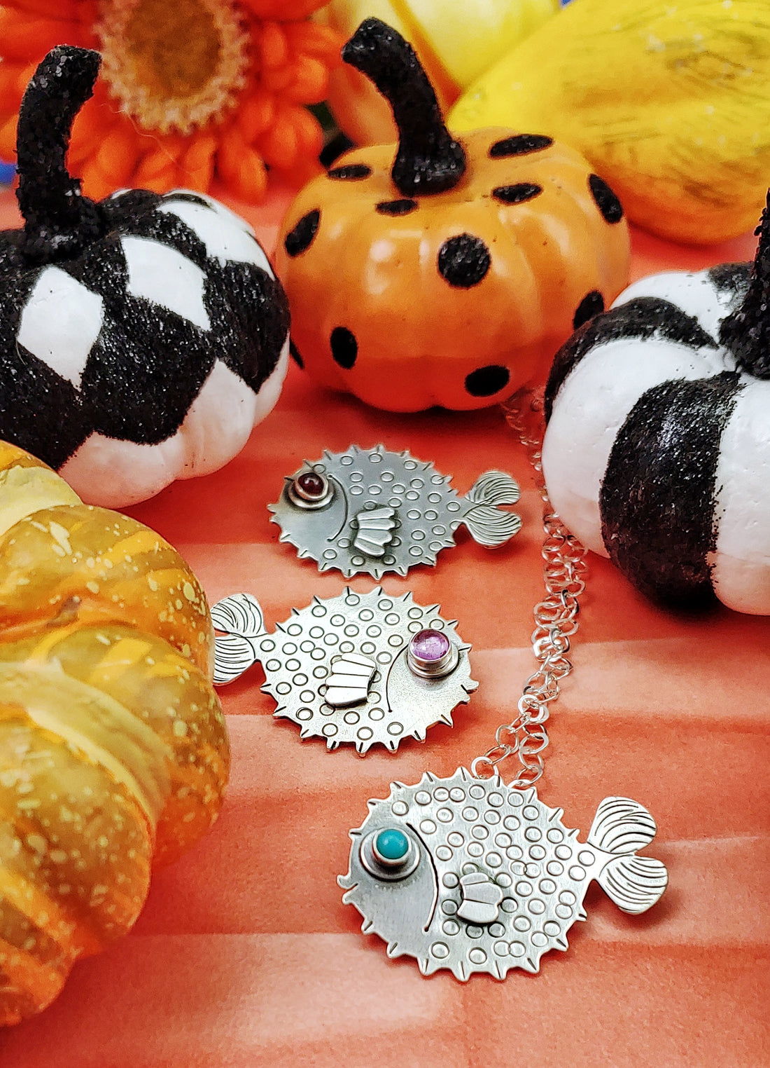 Puffer fish necklaces and pumpkins