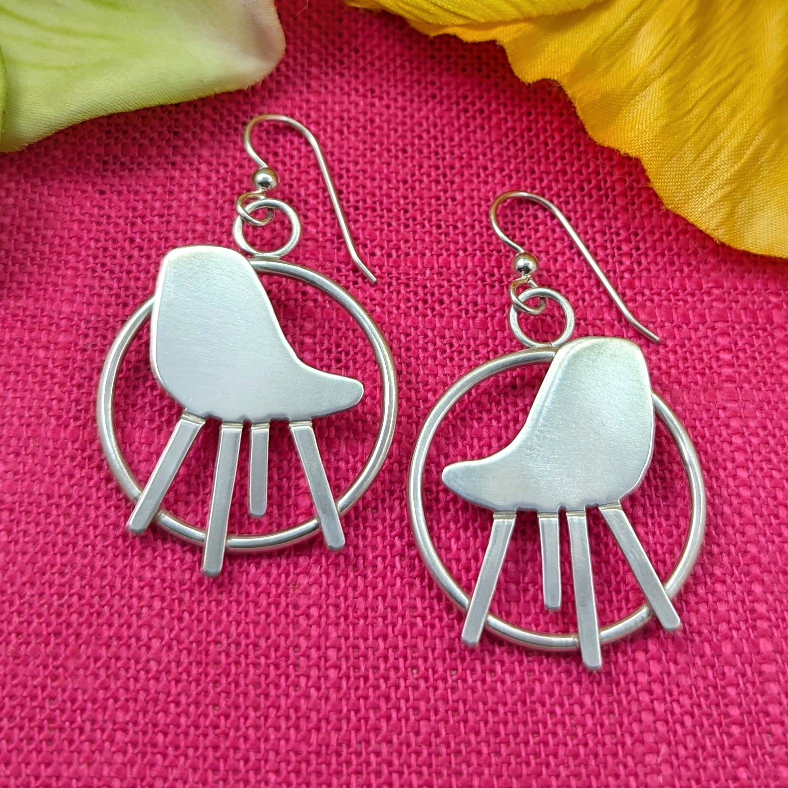 Mid century modern earrings in the Eames Chair style for a 17th wedding anniversary gift. The furniture wedding anniversary!