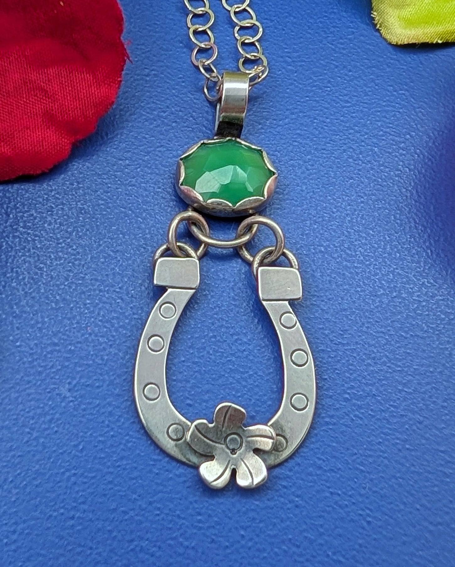Sterling silver horseshoe necklace with flower and green chrysoprase