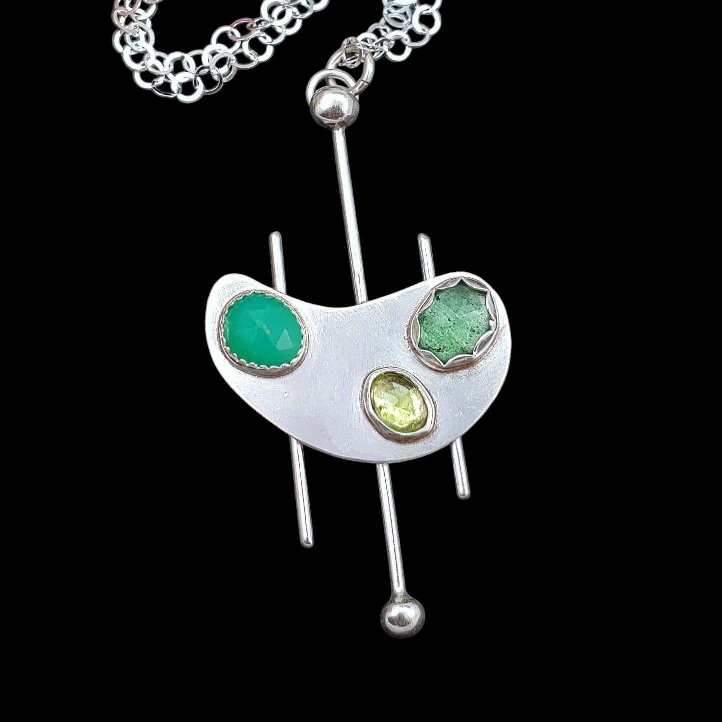 Handmade mid century modern kidney shape necklace featuring 3 kinds of green gemstones