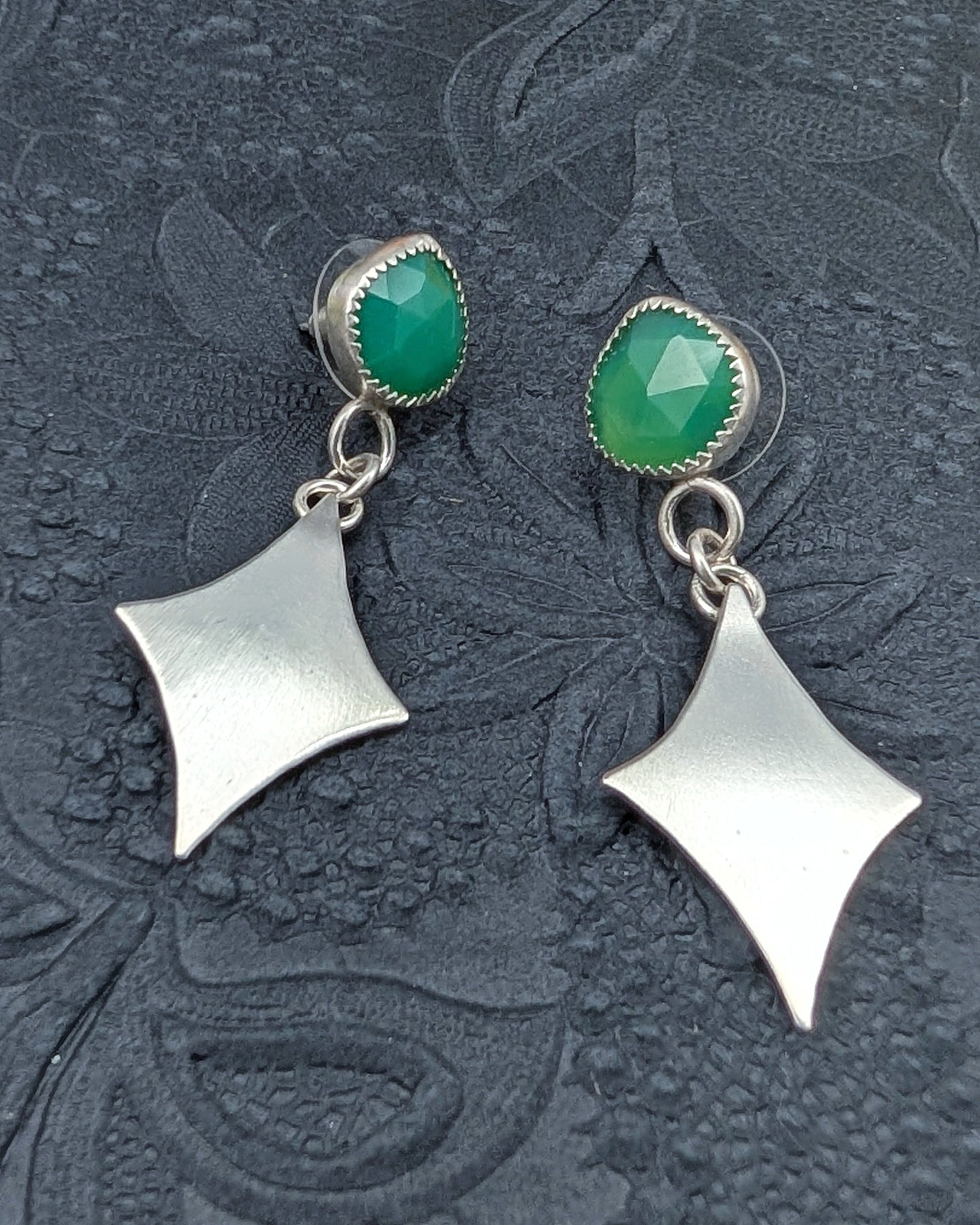 STerling silver retro diamond earrings with green chalcedony stones on black background