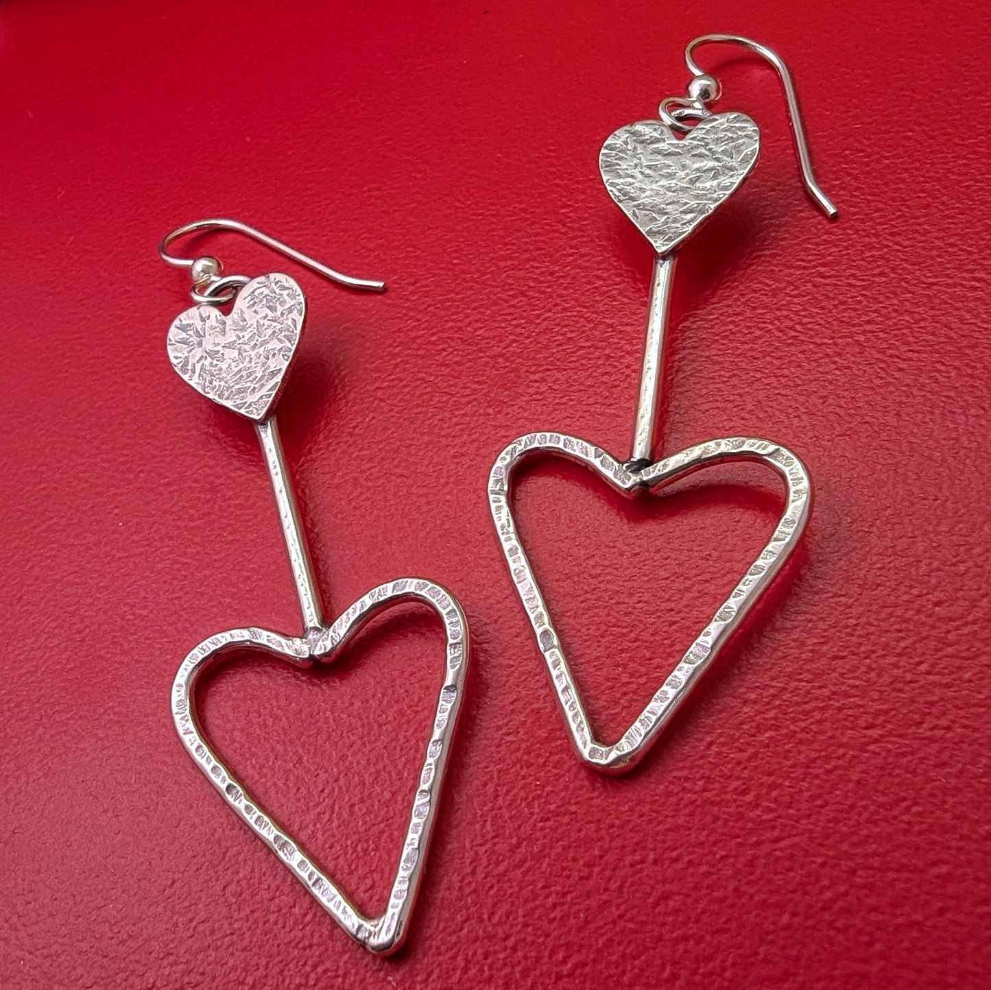 Retro inspired sterling silver lightweight heart earrings with stamped detailing