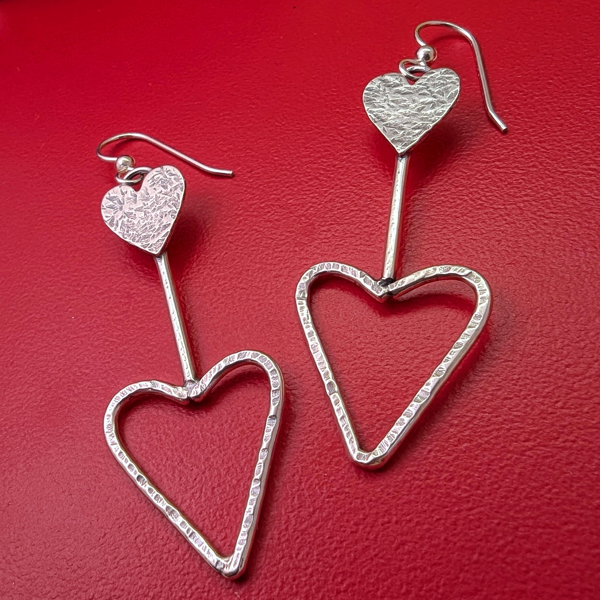 Retro inspired sterling silver lightweight heart earrings with stamped detailing