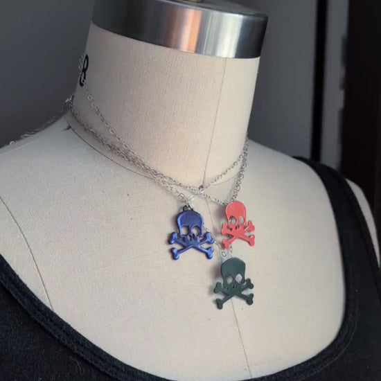 Video of all three colors of powdercoated skull necklaces