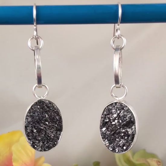 Video of sterling silver dangled earrings featuring sparkly black druzy
