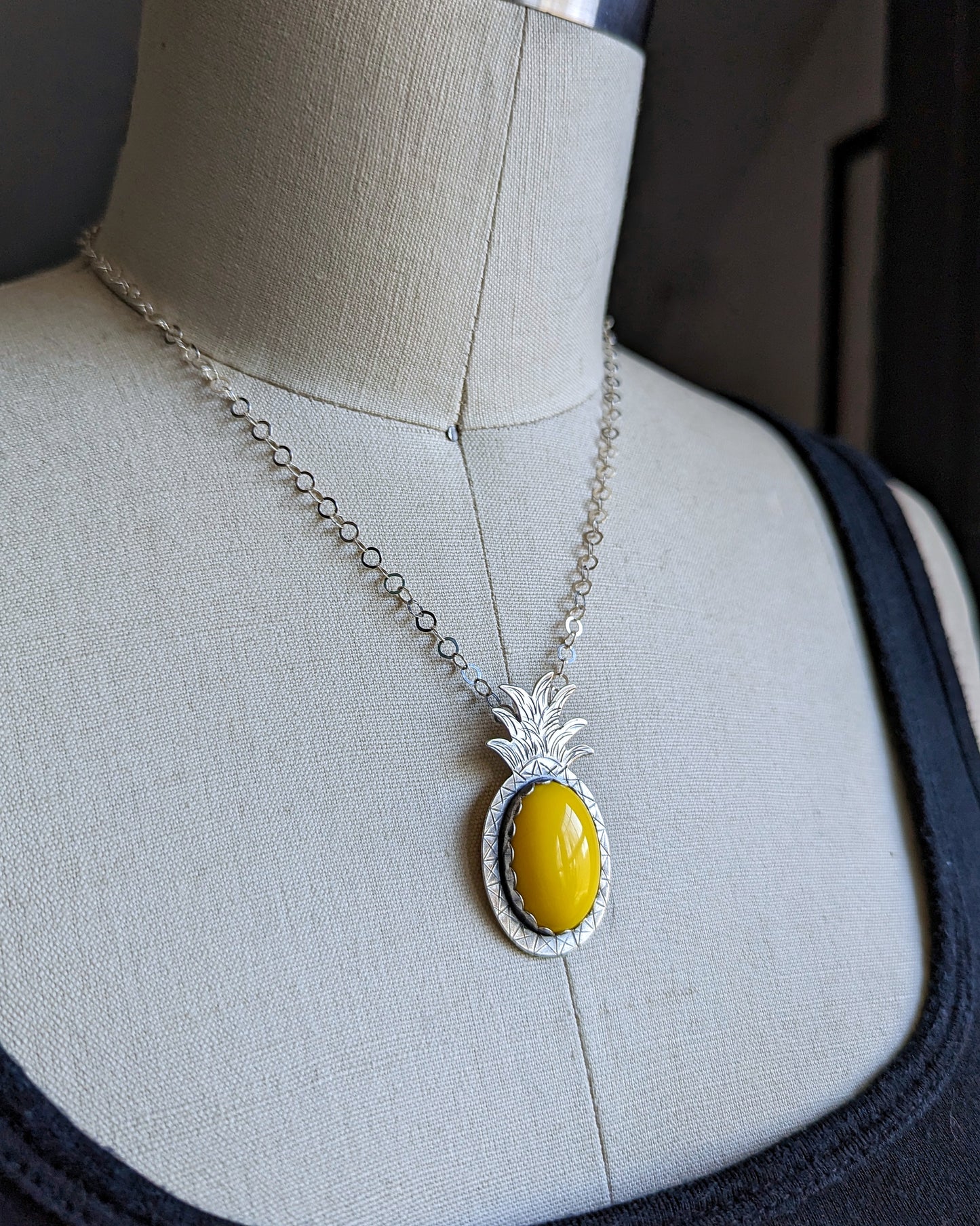 Handmade sterling silver pineapple necklace with a juicy yellow stone