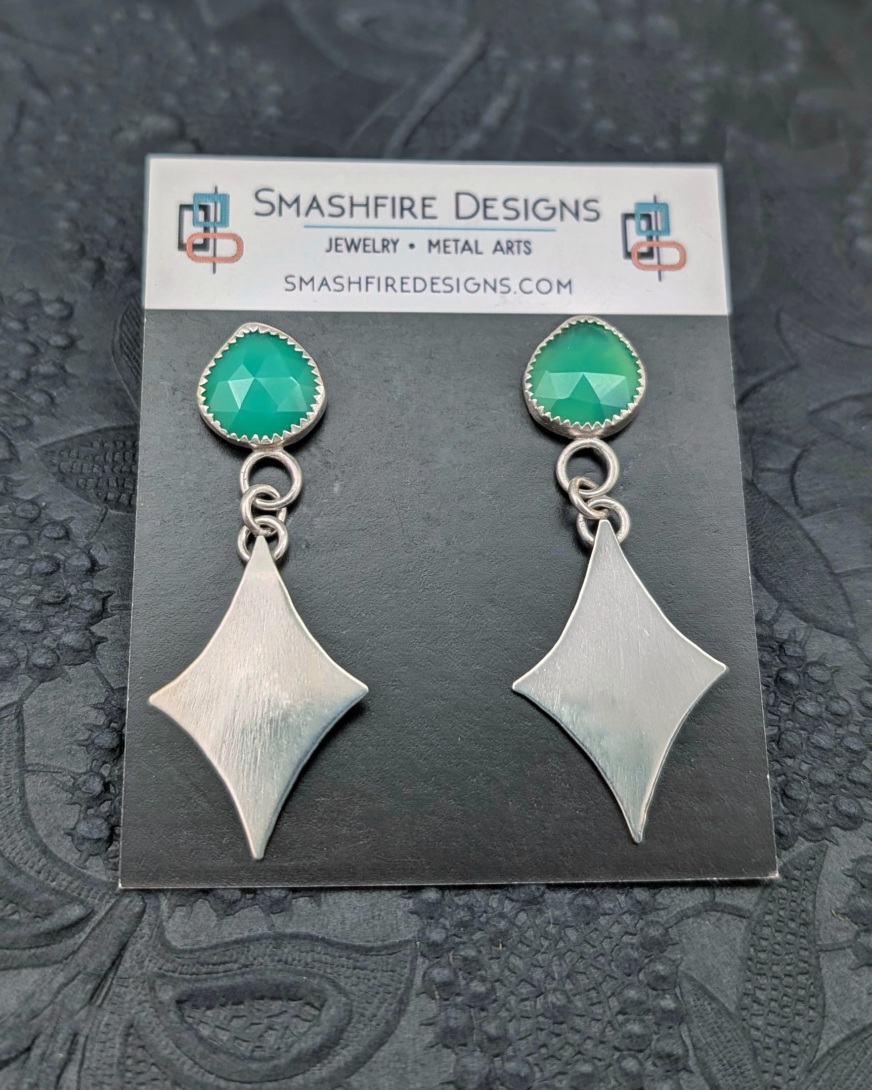 STerling silver retro diamond earrings with green chalcedony stones on earring card