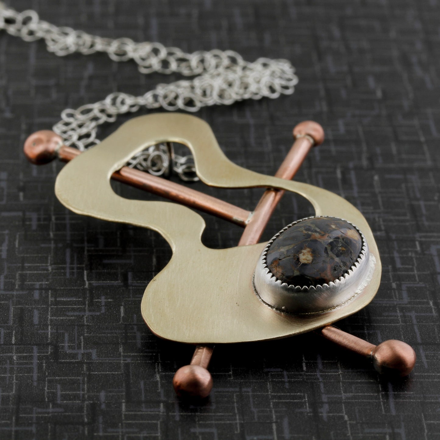 Brass, copper and fine silver abstract necklace inspired by the modernist jewelry, Frank Rebajes.