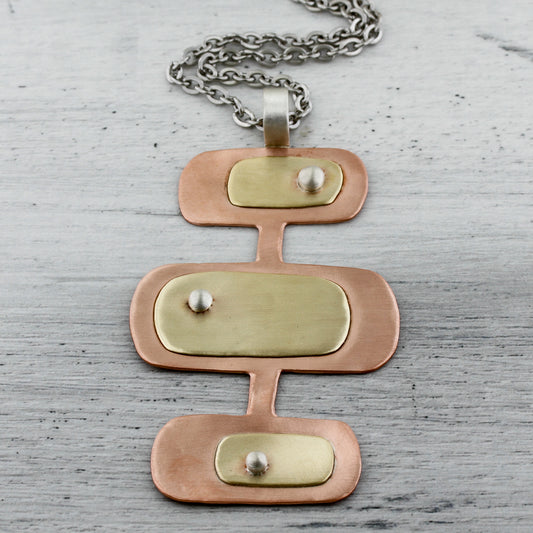 Triple decker rectangle necklace in copper and brass necklace.