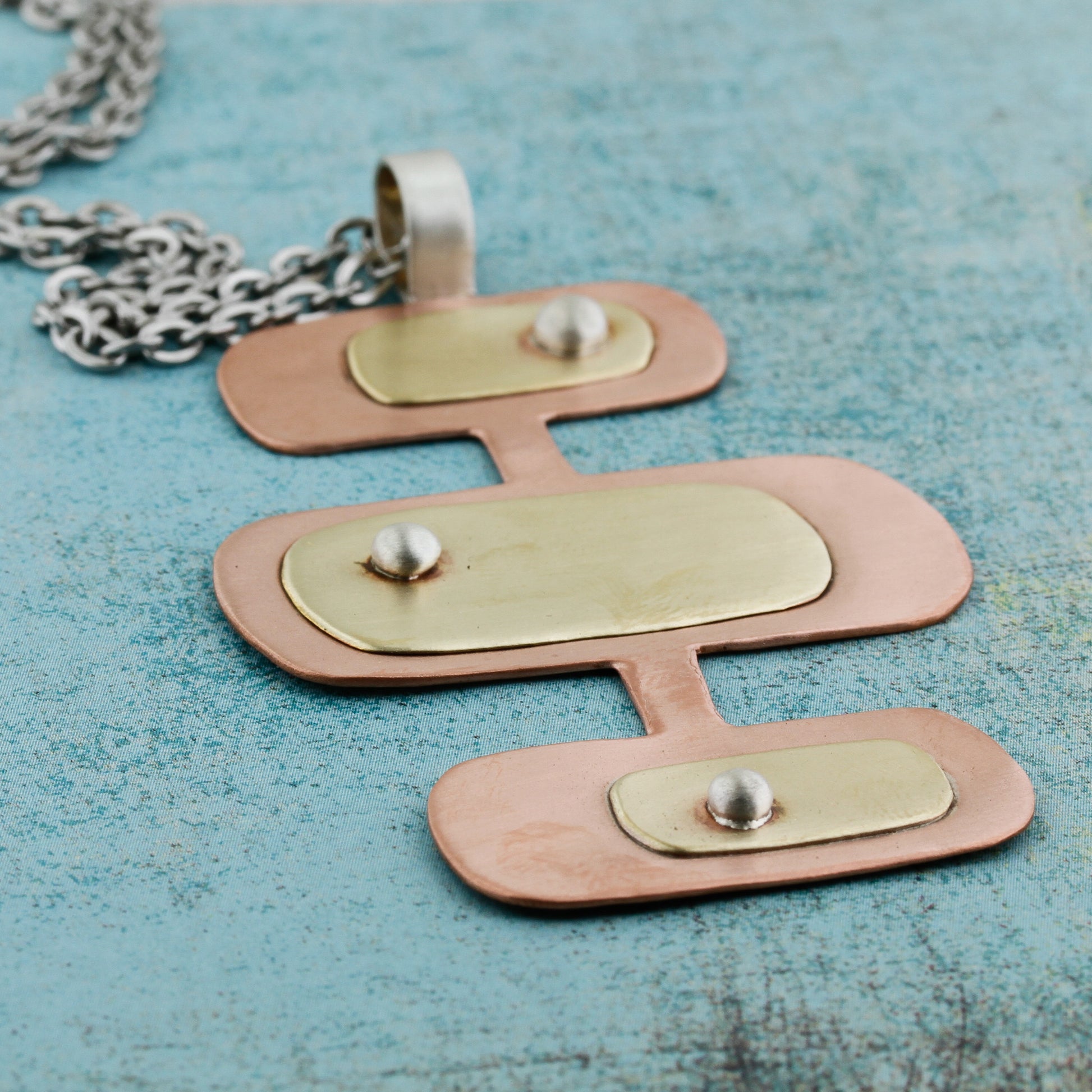 Modernist shapes in copper and brass necklace
