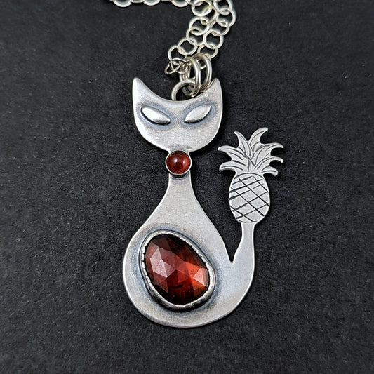 Sterling silver handmade cat with pineapple tail and garnet 