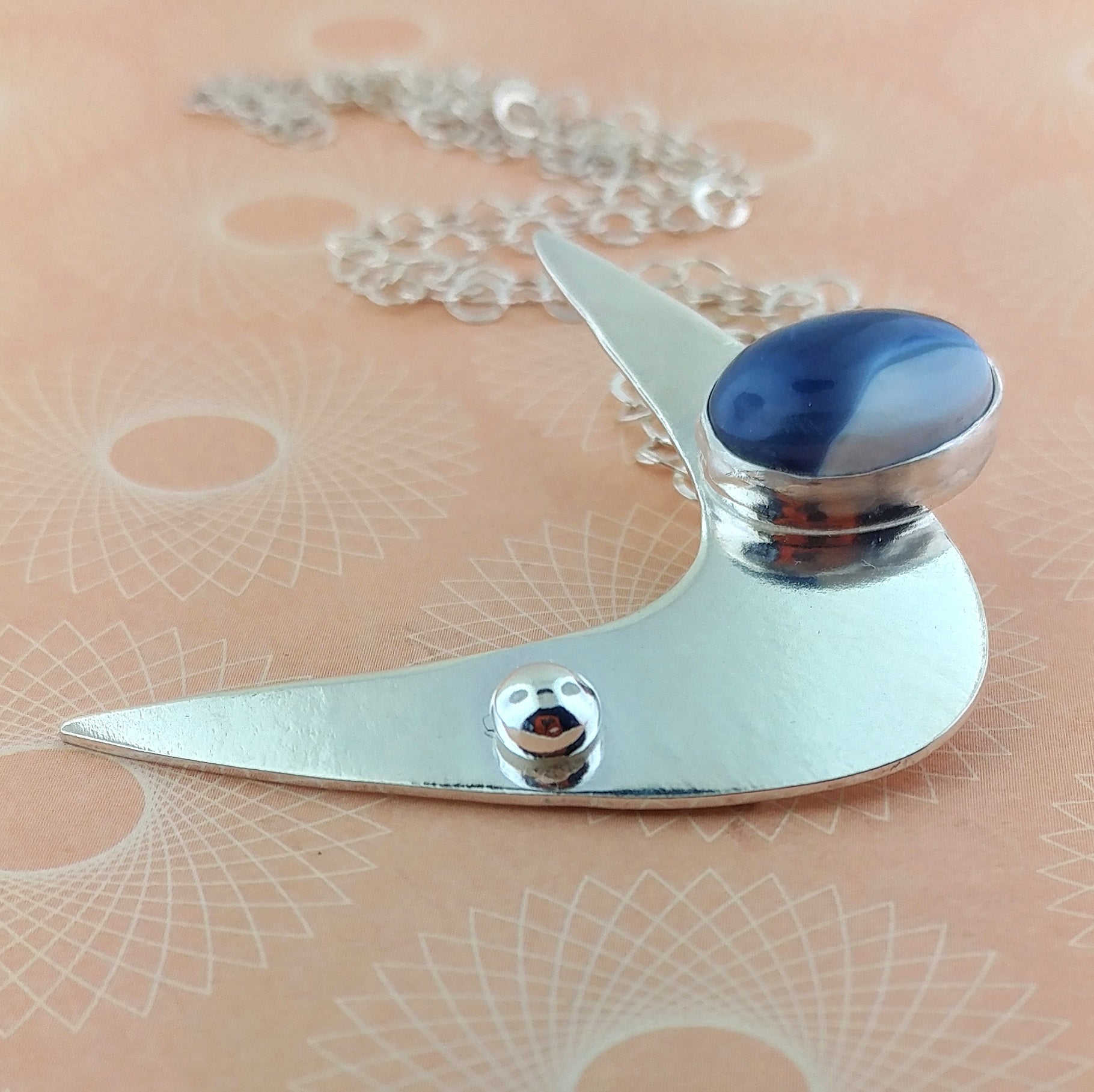 Modernist sterling silver and blue opal boomerang necklace