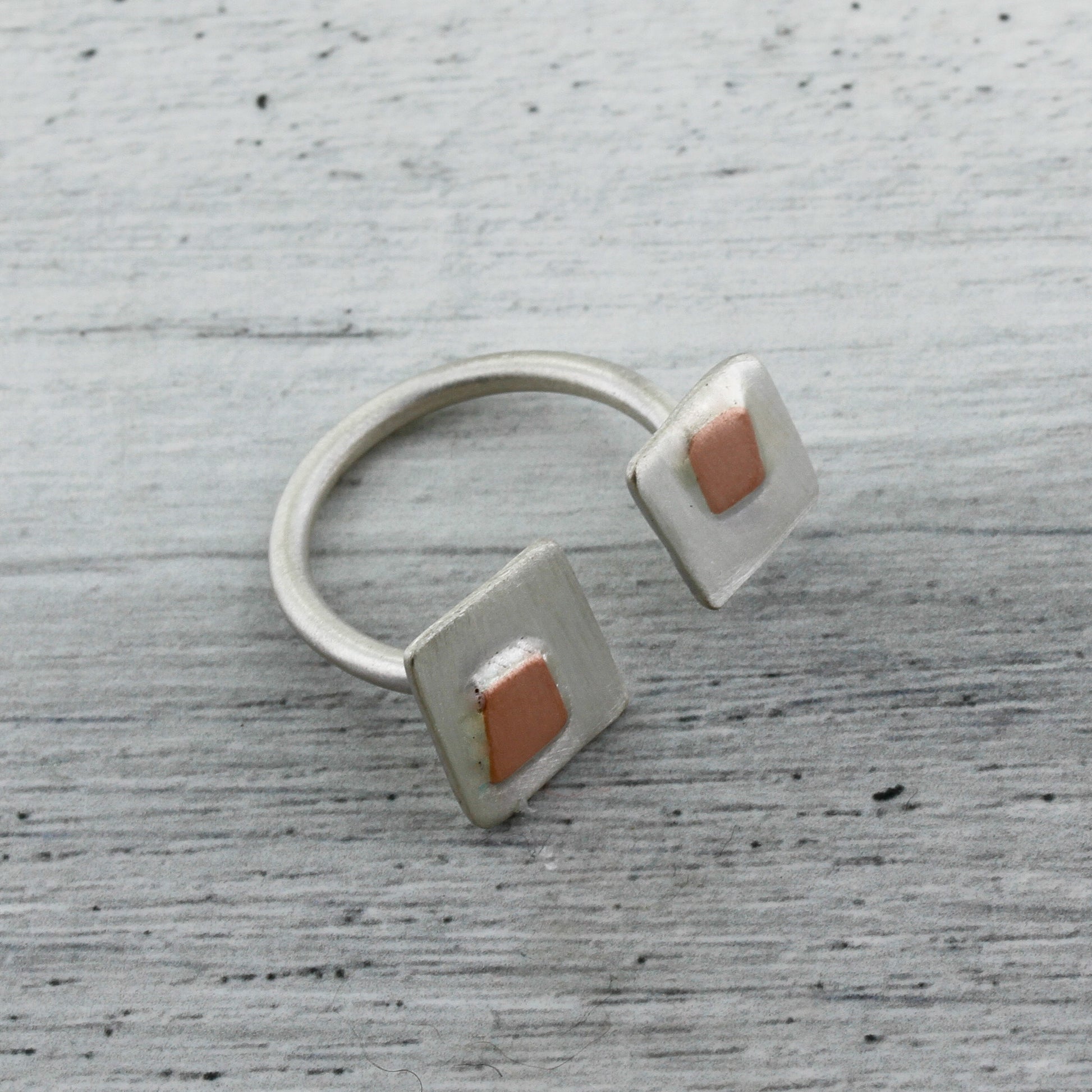 Sterling silver and copper in between the finger ring