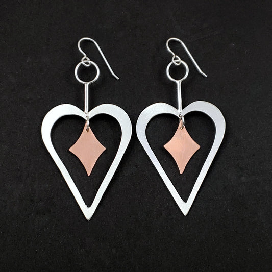 Sterling silver heart earrings with copper retro diamond dangles in the center