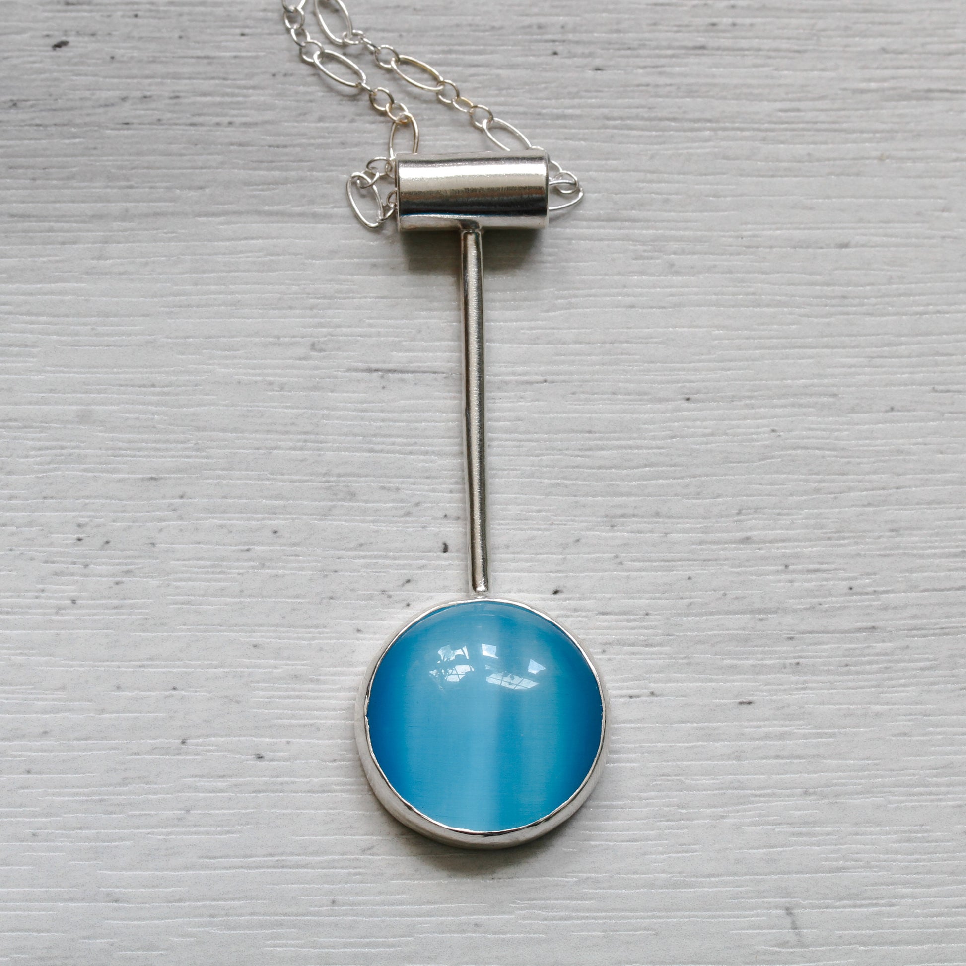 Turquoise blue cat's eye sterling silver necklace in minimalist design